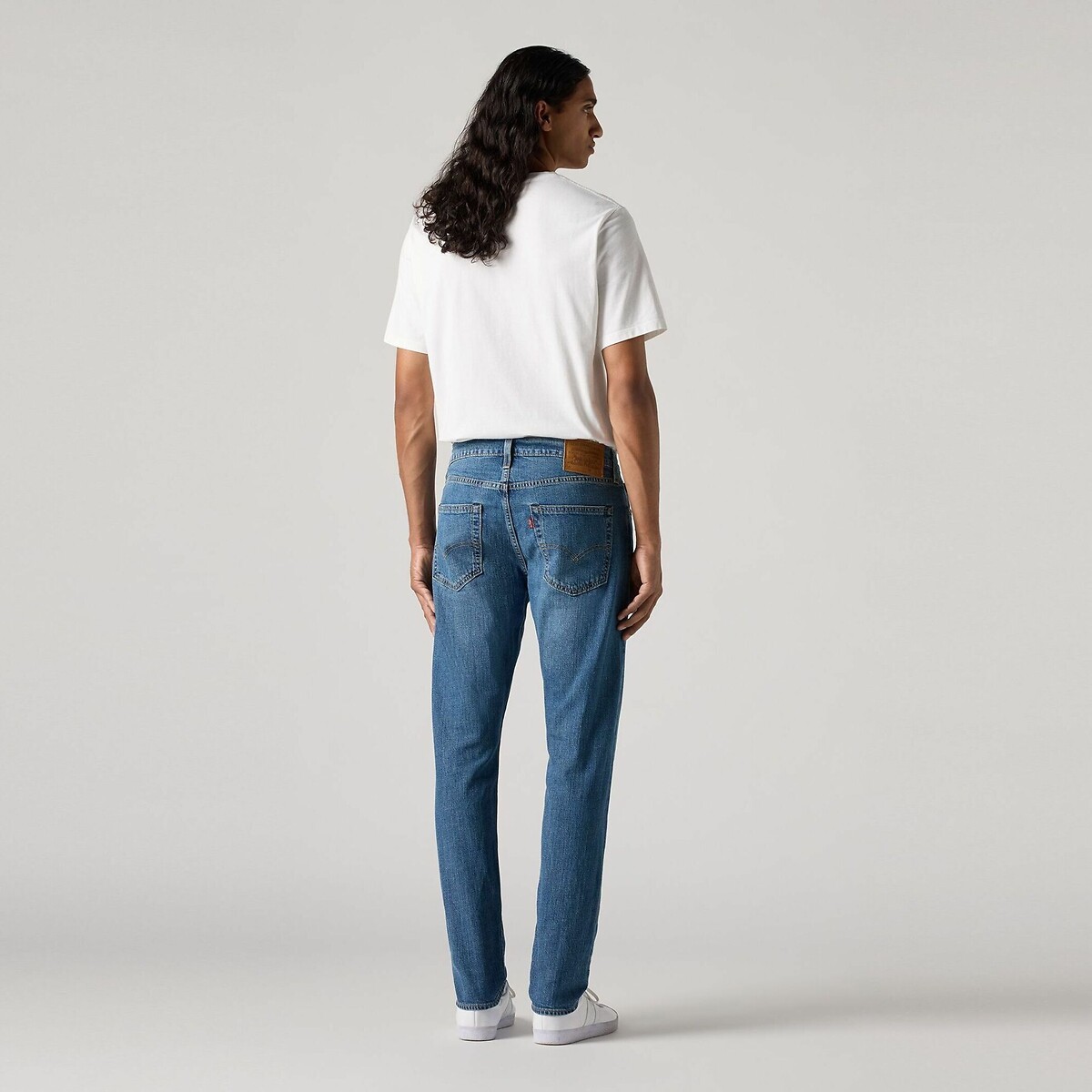 Calça jeans slim Taper 512® da Levi's em algodão e linho.
