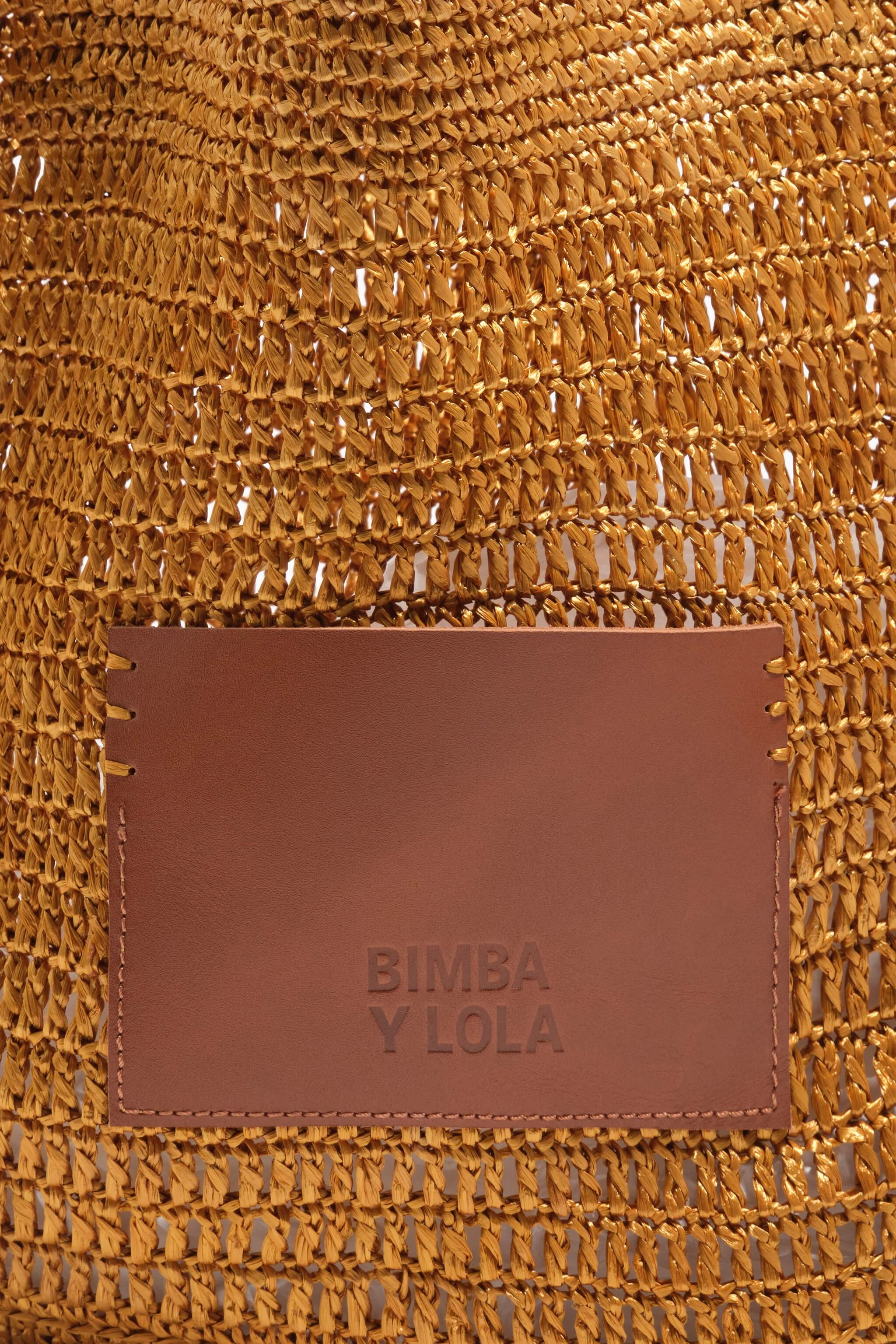 Bolsa grande trançada dourada
