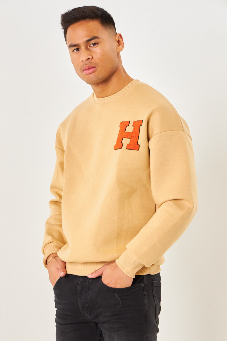 Sweat beige foncé à écusson 