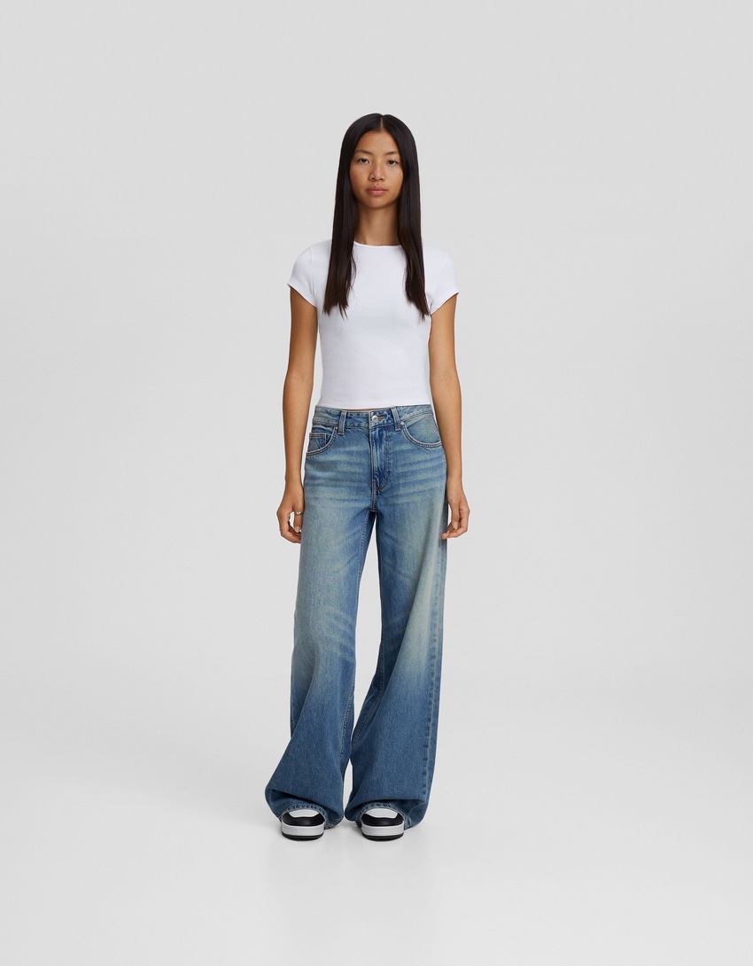 calça jeans de perna larga