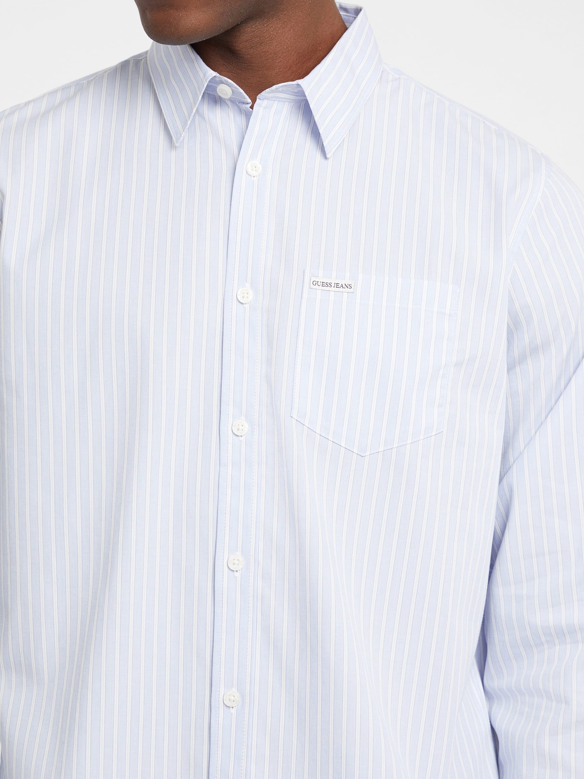 Camisa listrada com bolso