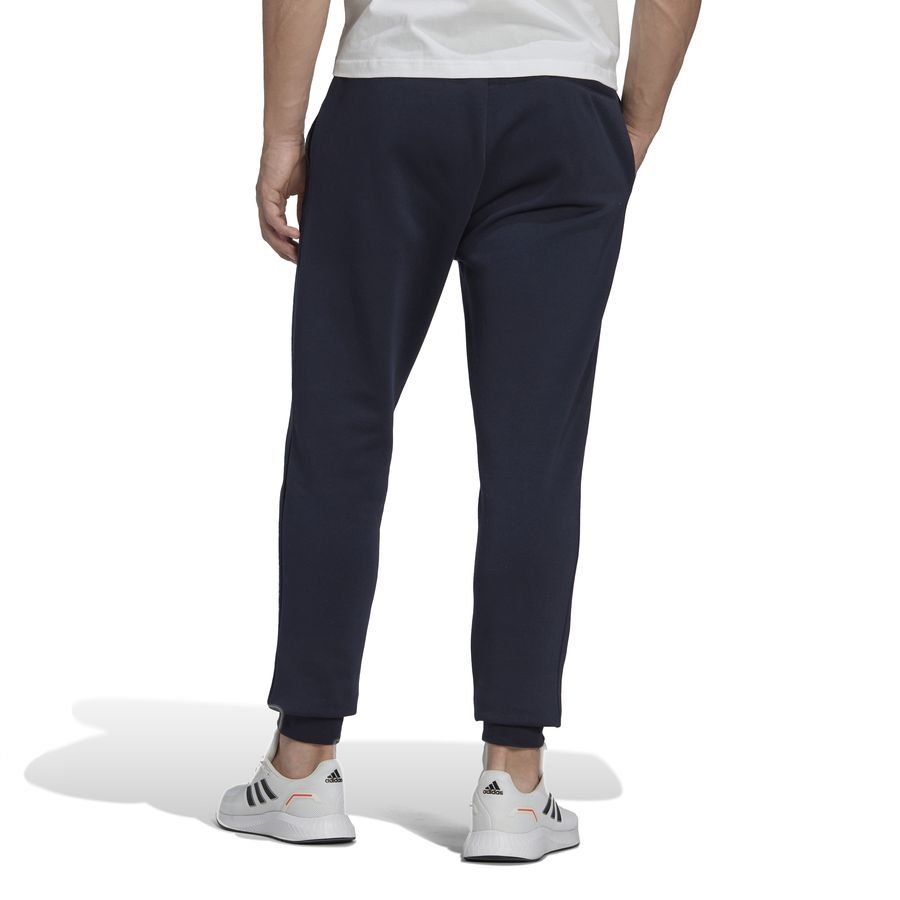 adidas Bas de Survêtement Essentials Fleece Tapered - Bleu Marine/Blanc