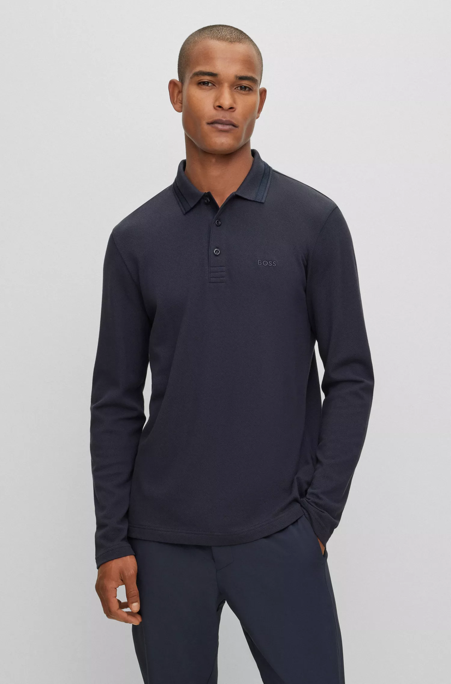 Camisa polo BOSS verde de manga comprida em piqué de algodão com logotipo contrastante.