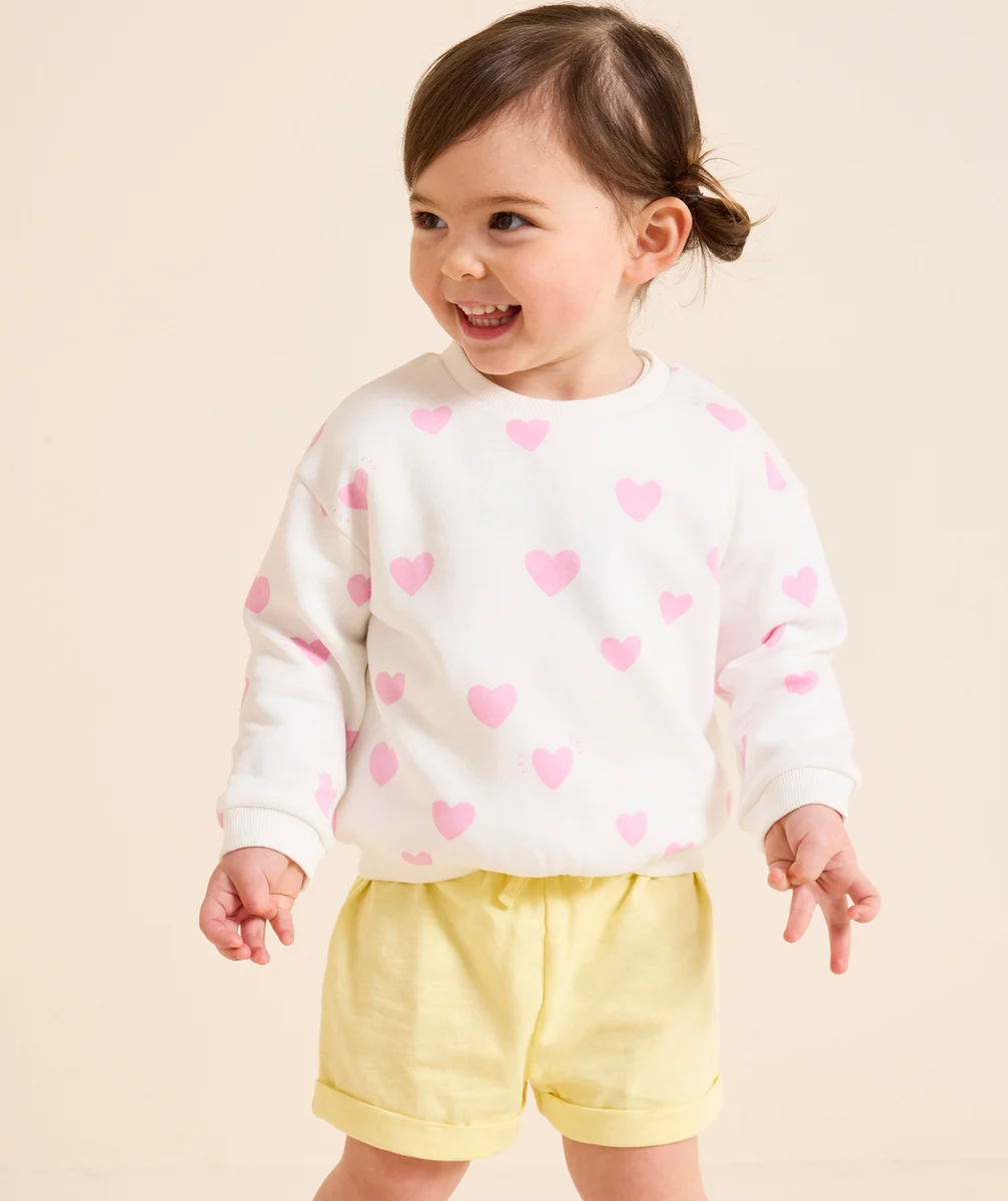 short bébé fille en coton bio jaune avec revers