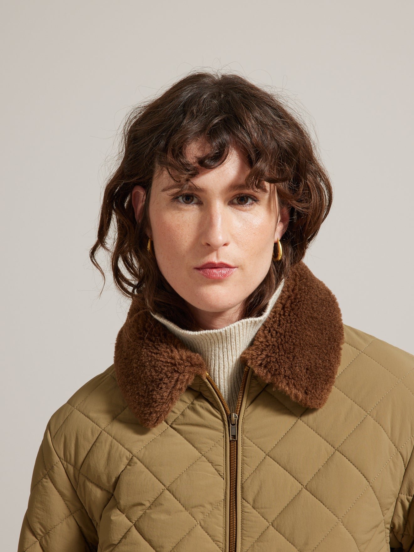 Veste matelassée col fausse fourrure femme