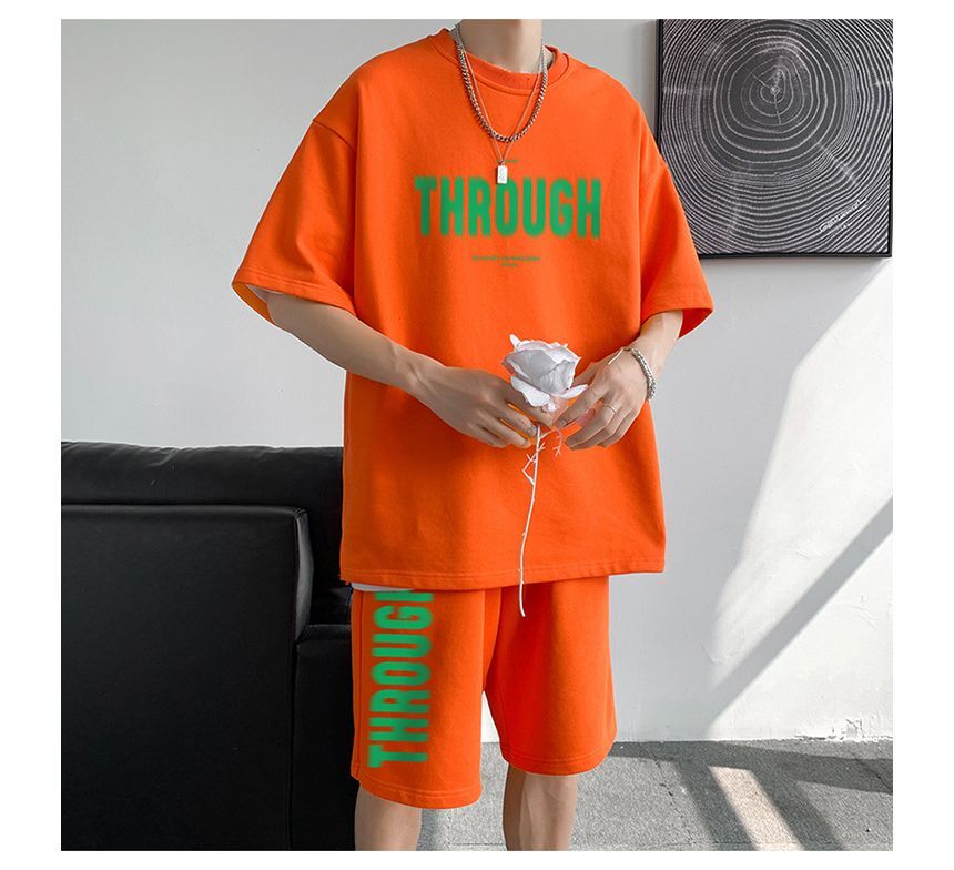 POSI - Set: T-shirt met korte mouwen en belettering + korte broek