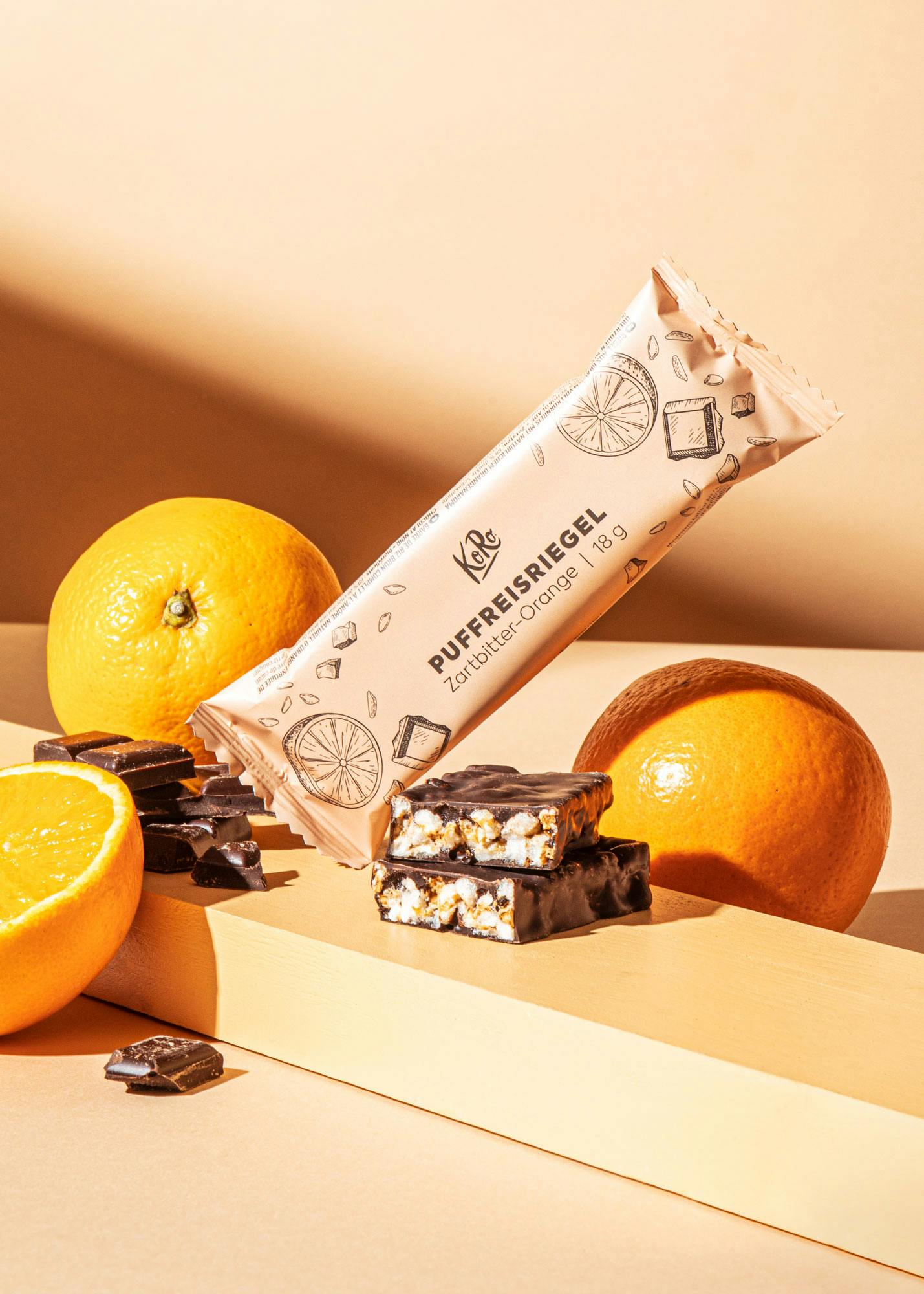 Puffreisriegel in Zartbitterschokolade mit Orange 18 g