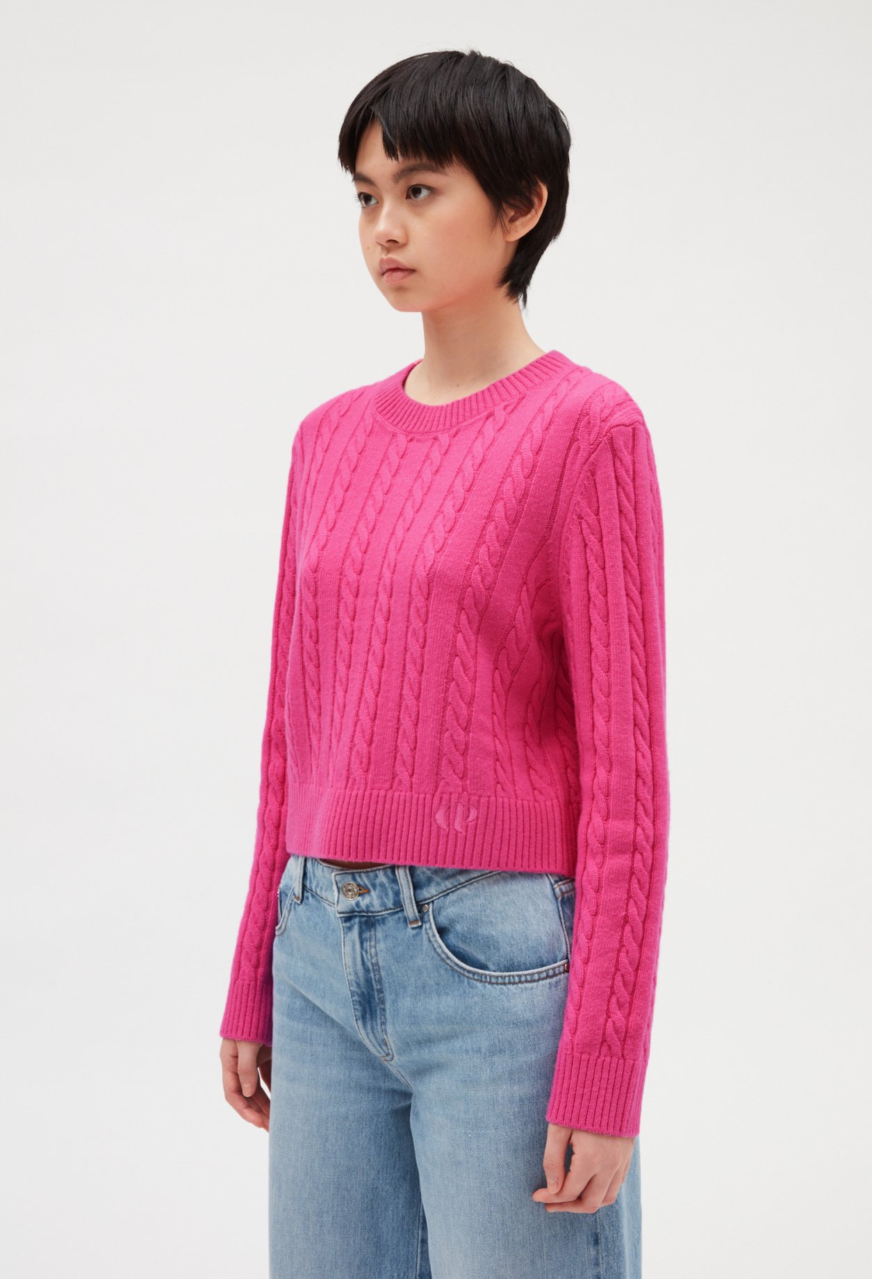 Pull court maille torsadee