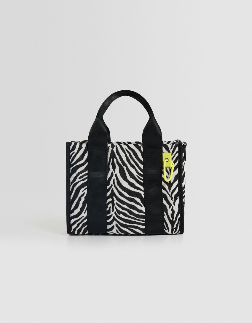 Bolsa transversal multifuncional com estampa animal
