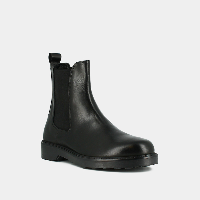 Boots à talons plats et bouts ronds  en cuir noir