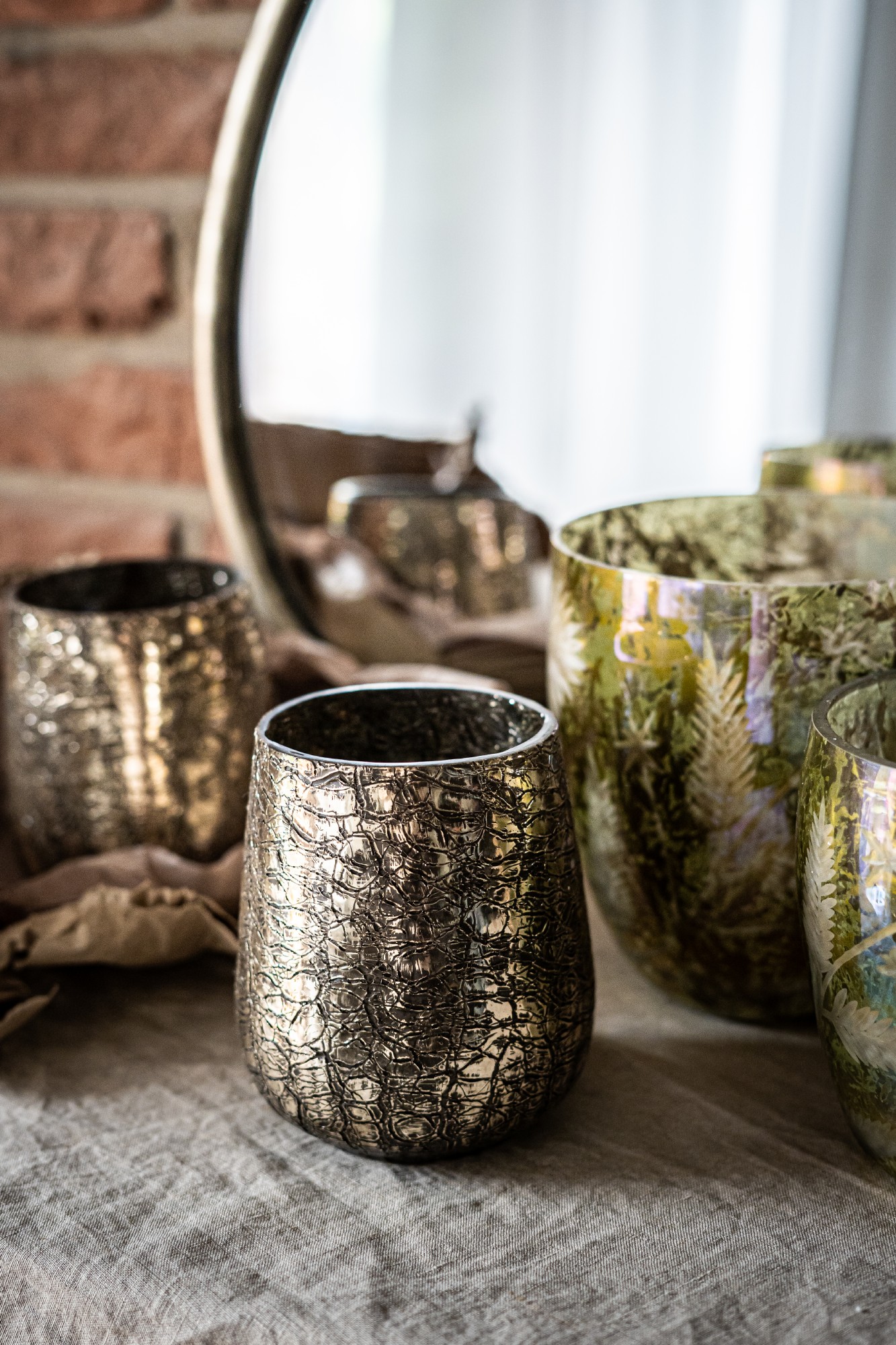 Glas-Windlicht 'Serpent', gold, Ø 11 cm, H 15 cm von fischer's lagerhaus