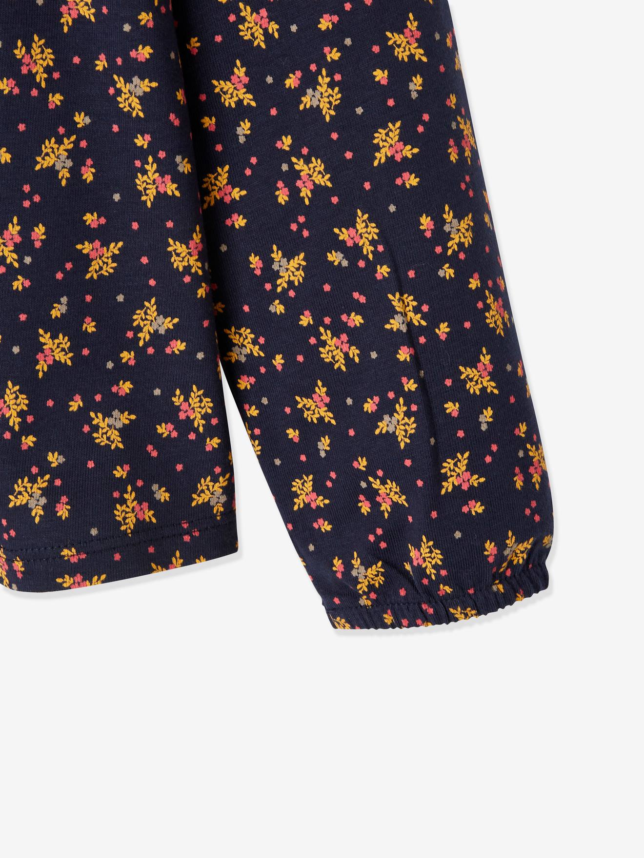 Blusa rosa claro com estampa floral para meninas.