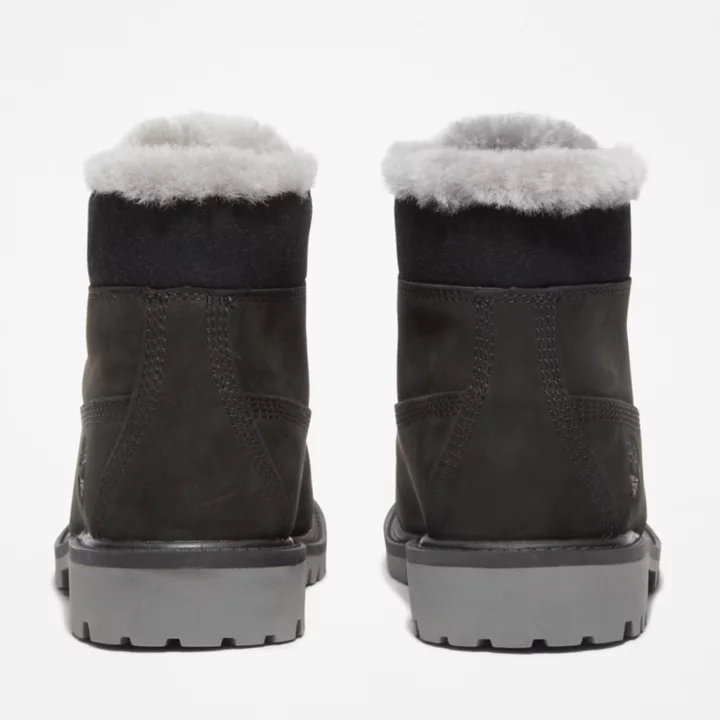 Bota de inverno Timberland Premium de 6 polegadas para jovens, na cor preta.