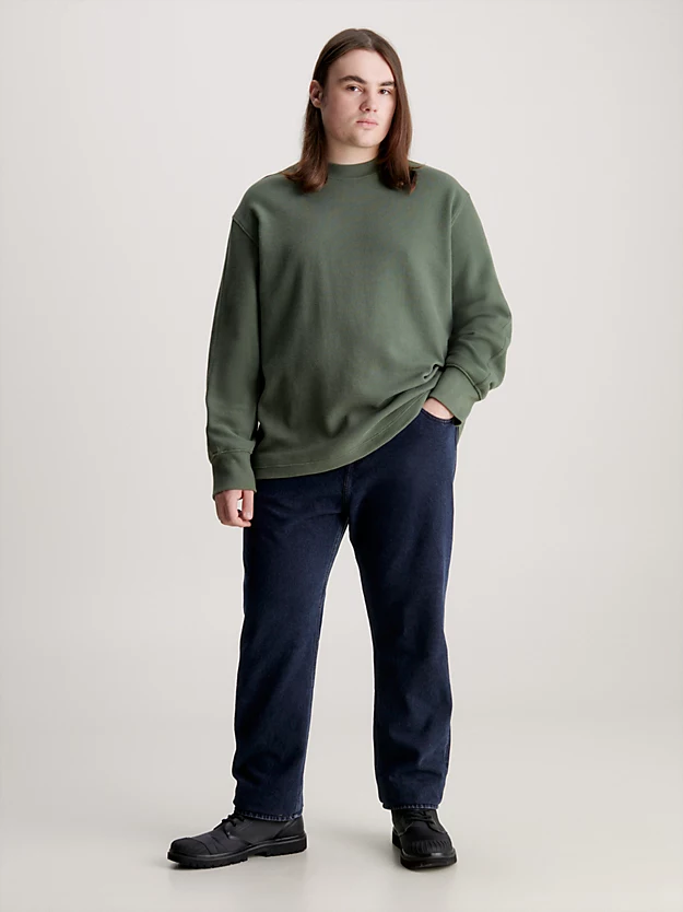 Calça jeans afunilada plus size