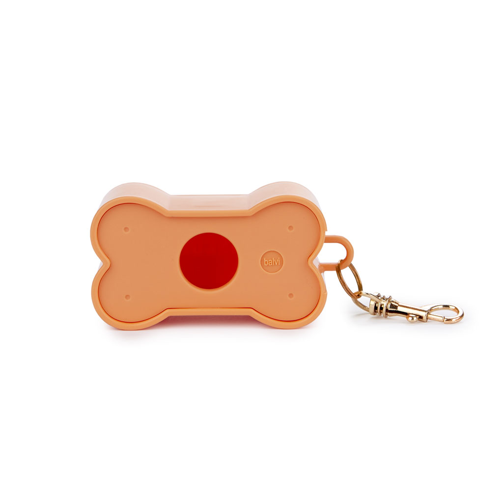 Dispensador de sacos para dejetos de cachorro Balvi Biscuit, laranja, para passeios com seu pet, em formato de biscoito, de plástico.