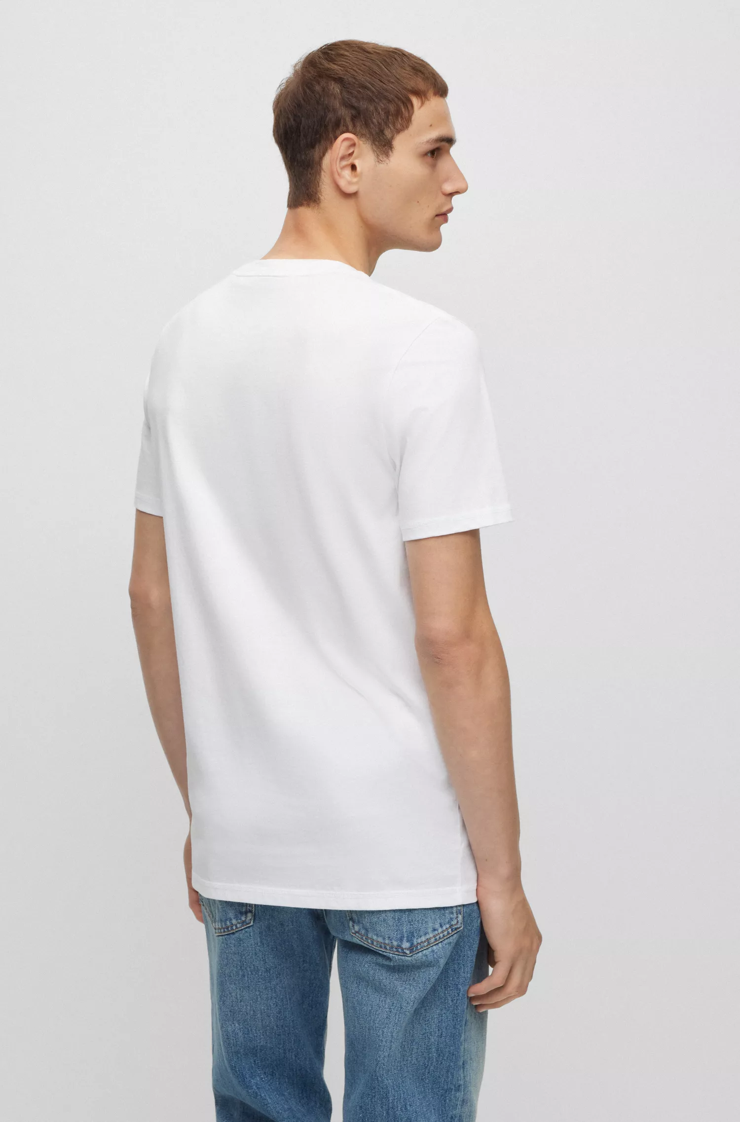 Camiseta BOSS laranja, modelagem relaxada, em algodão com estampa sazonal.