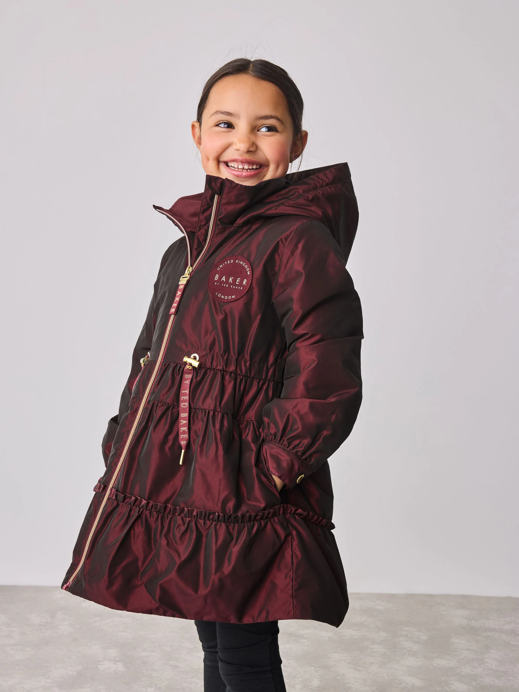 Bessenroze - Baker by Ted Baker regenbestendige regenjas met ruches