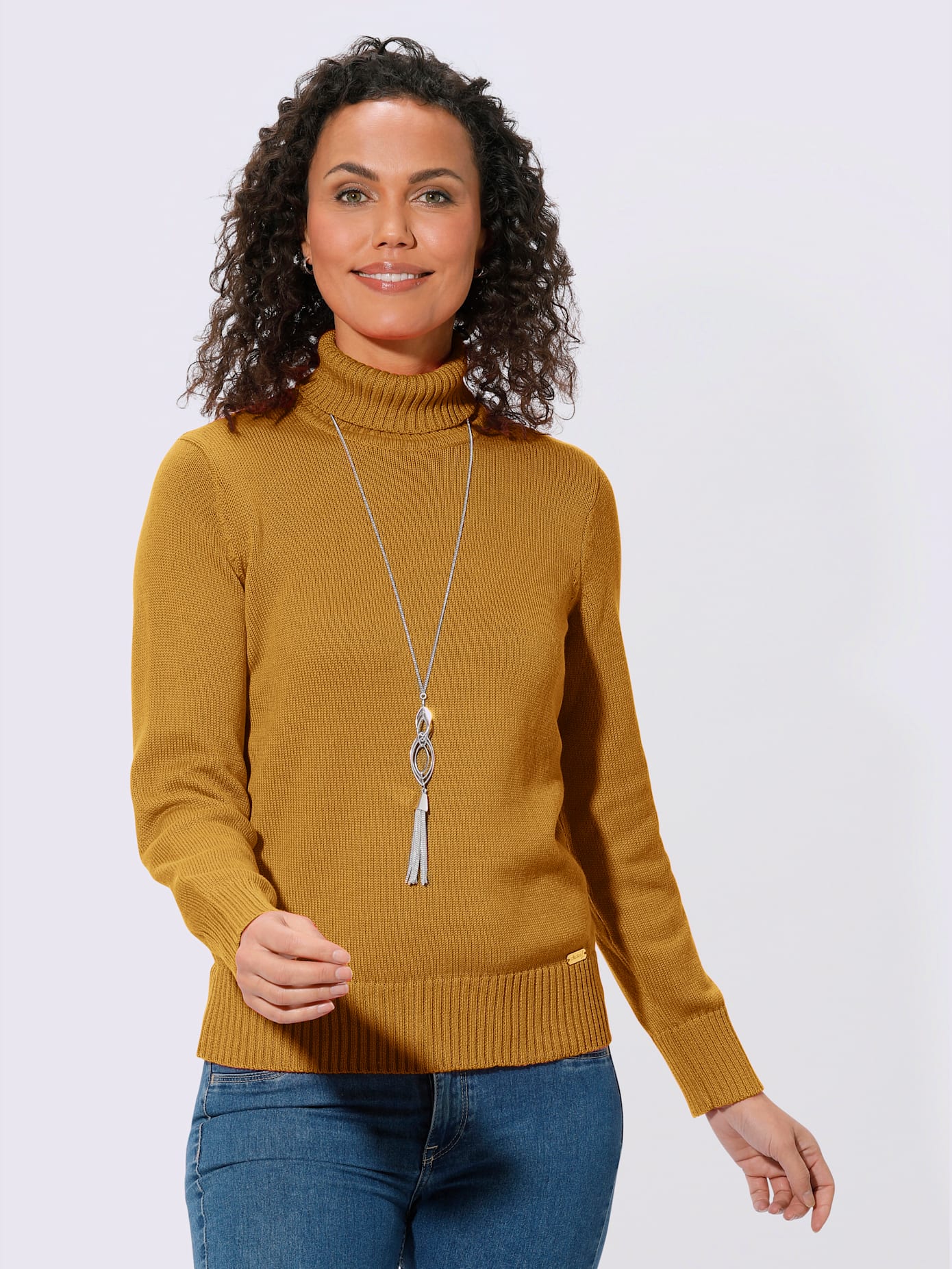 Pull femme col roulé manches ourlet avec finitions côtelées
