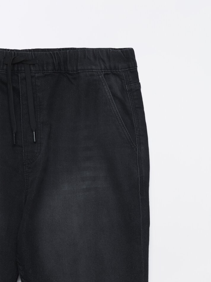 Calça jeans jogger elástica - Preta