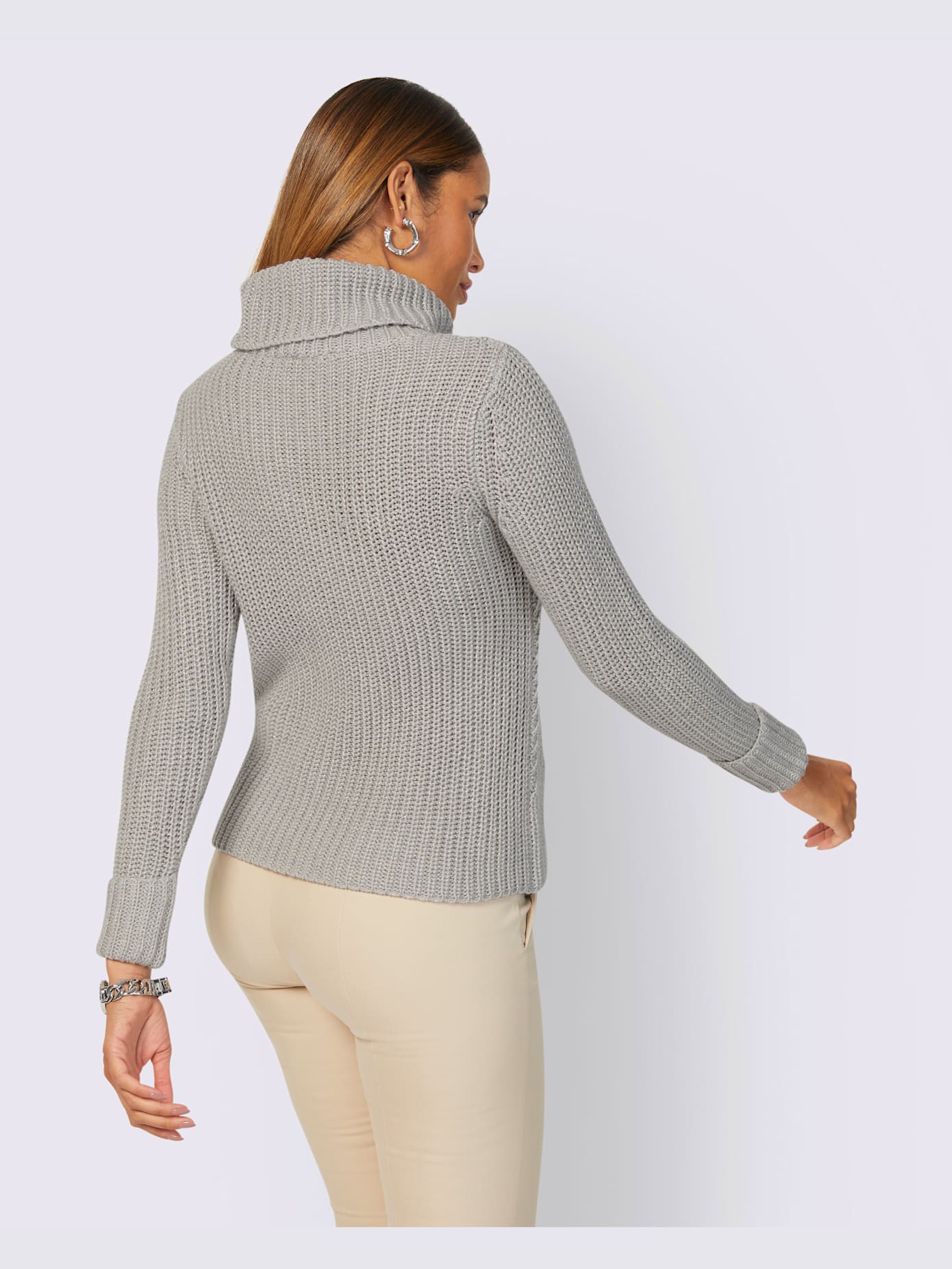 Pull col roulé flatteur