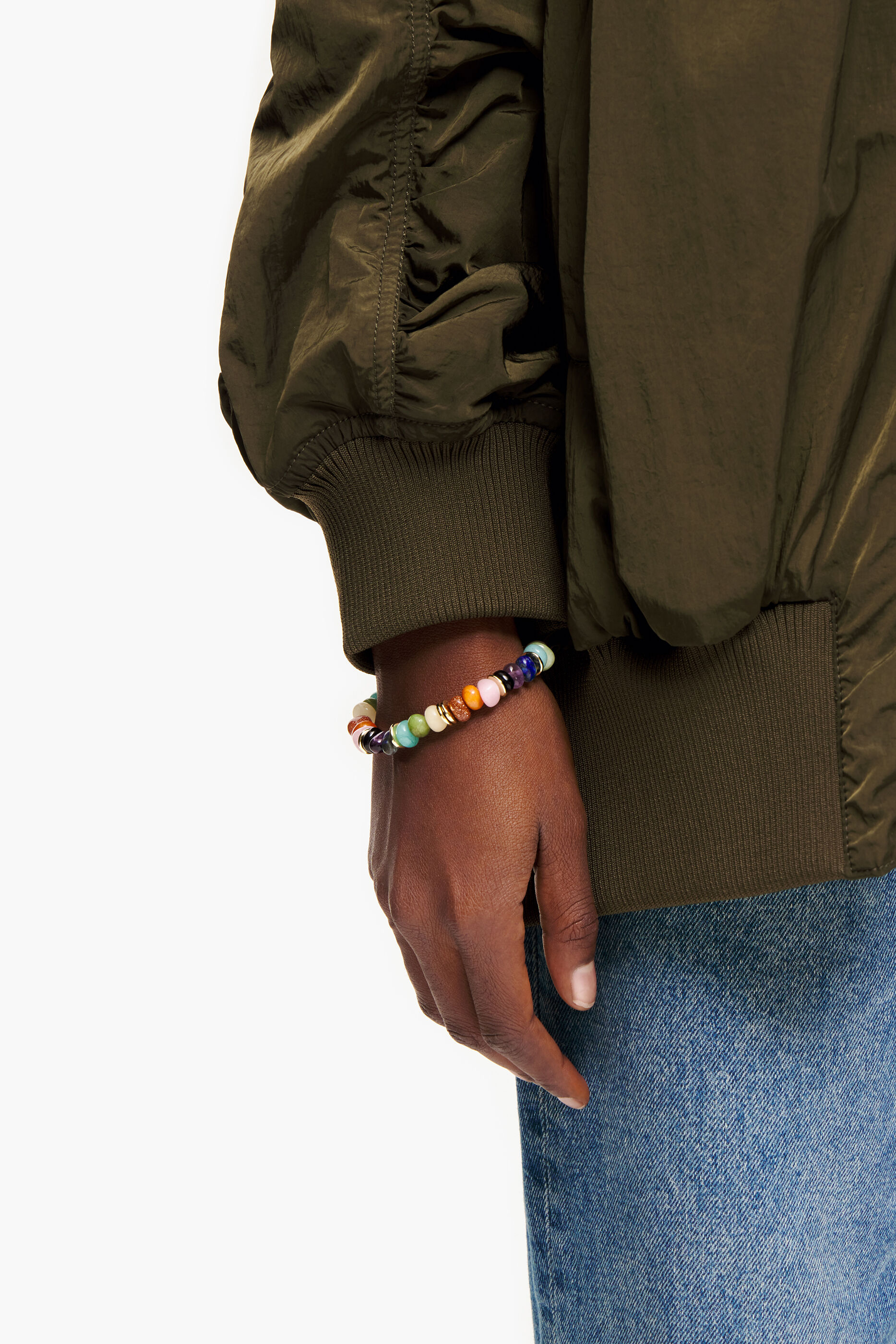 Pulseira dourada com pedras multicoloridas