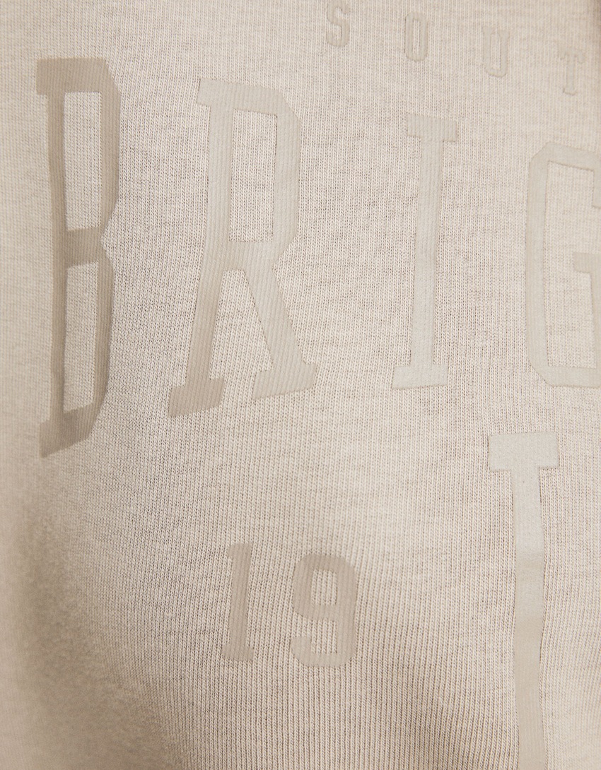 Moletom oversized com efeito desbotado e slogan