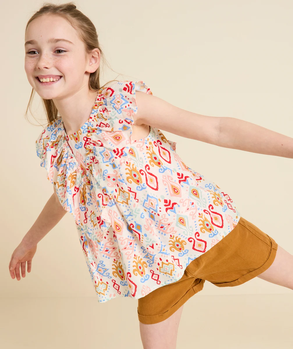 blouse manches courtes fille écrue imprimé géométriques et volants