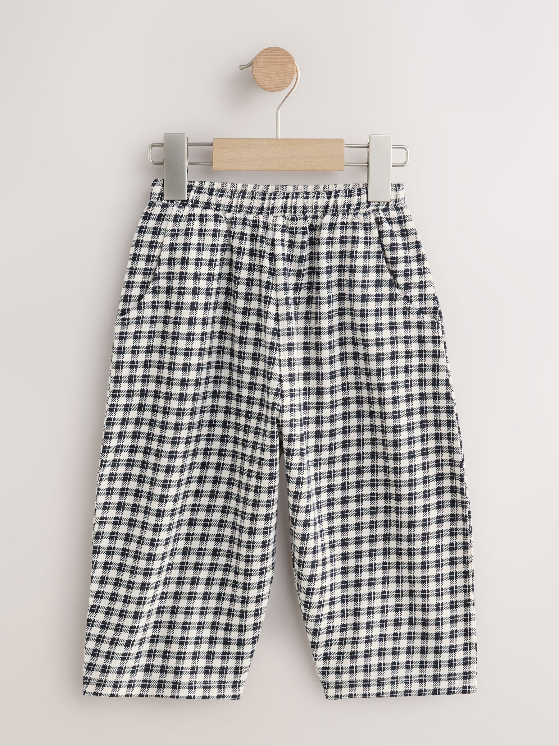 Zwarte/witte gingham-ruit - Broek met structuur en wijde kortere pijpen (3mnd -7jr)