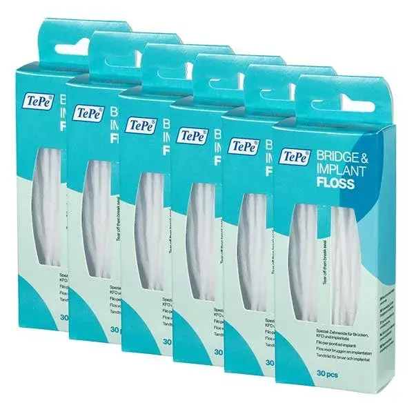 Fio dental TePe para ponte e implante, 6 caixas com 30 unidades cada.