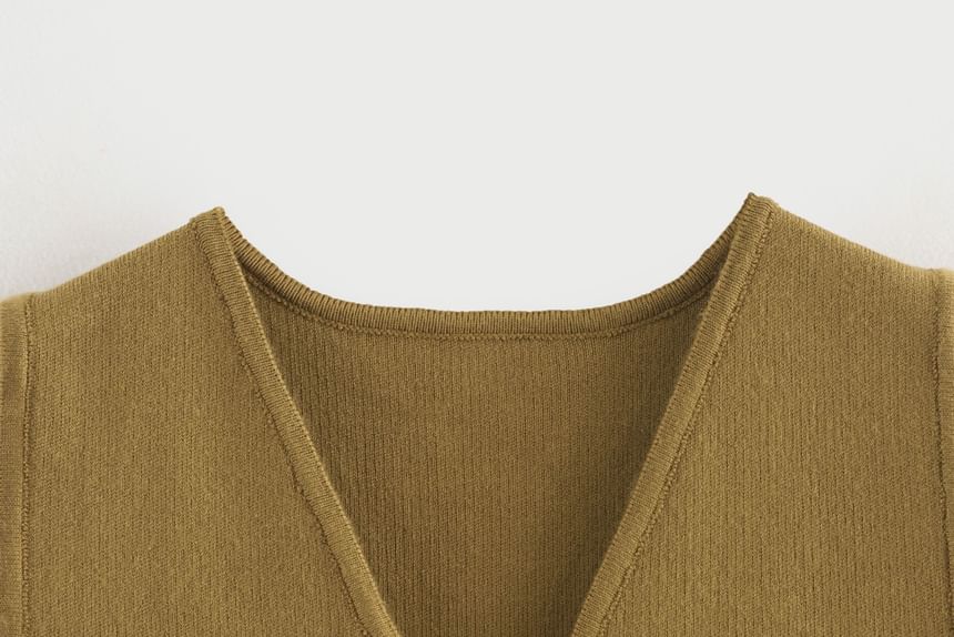 Cumulys - V-hals effen vest met knoopjes
