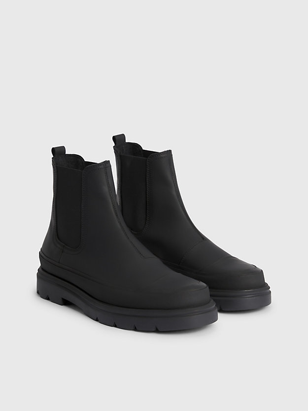 botas de couro até o tornozelo