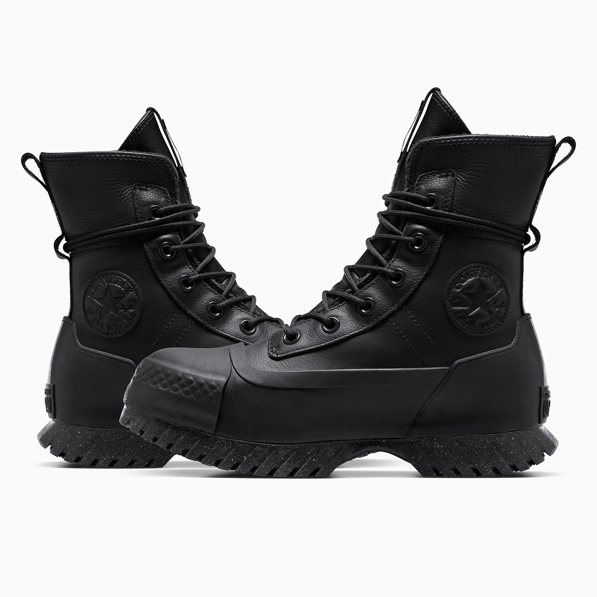 CONVERSE<br>Botas de cano curto em couro com salto baixo