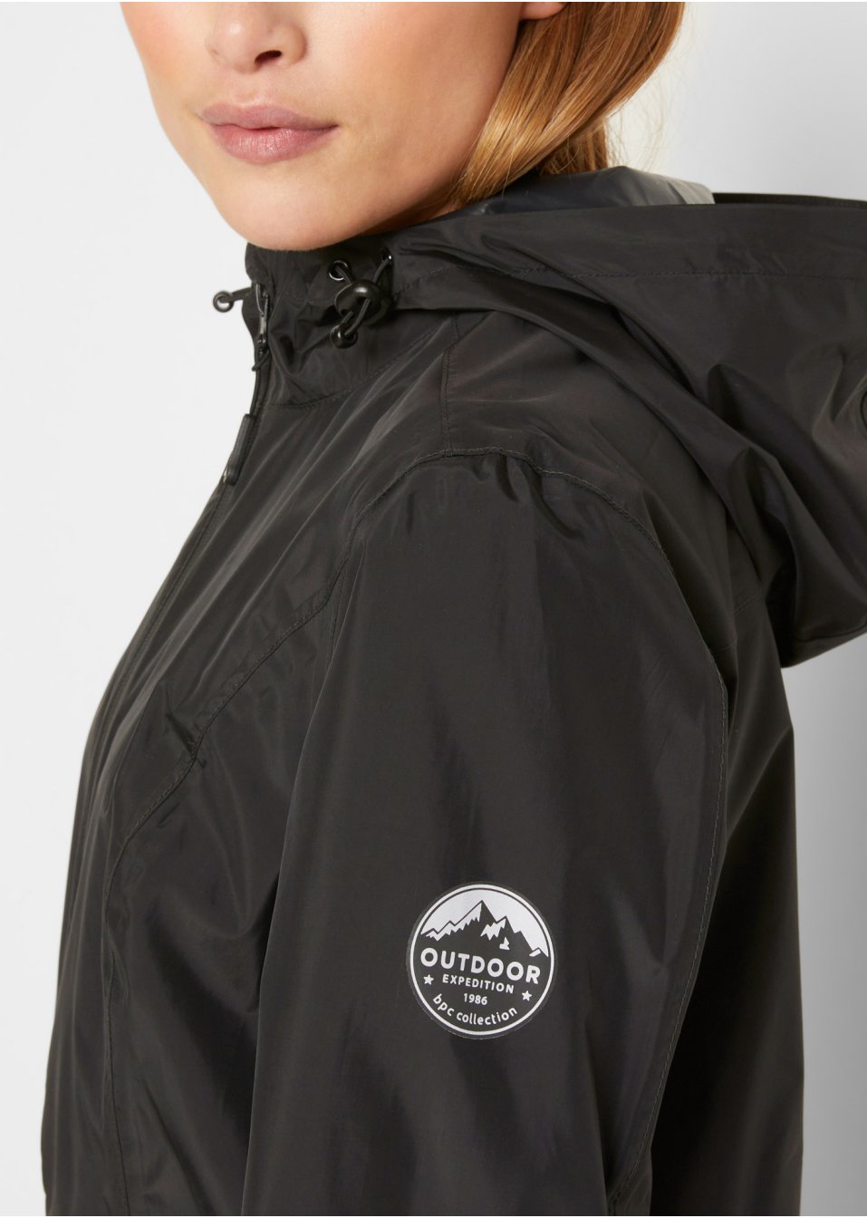 Veste imperméable avec pochon de rangement