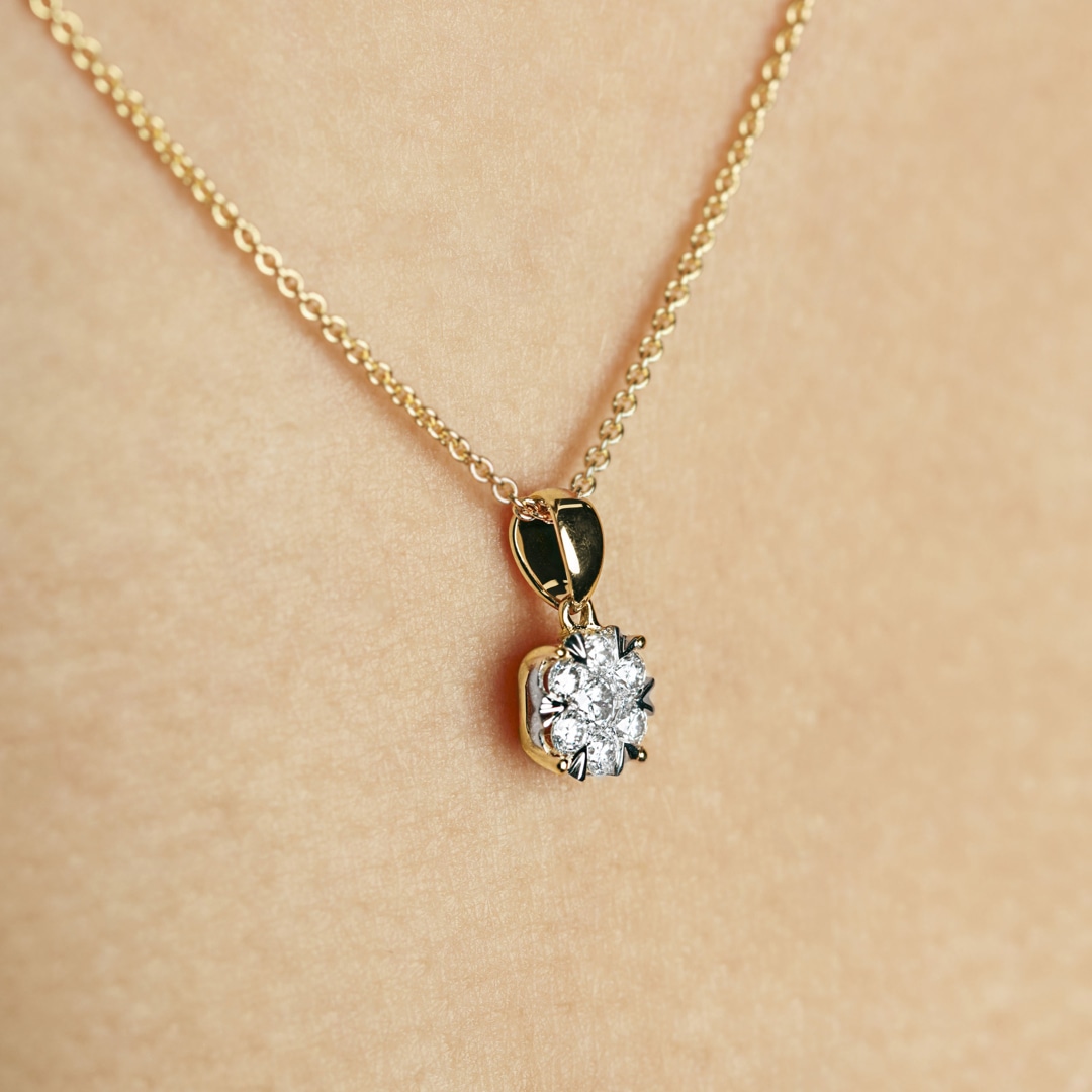 Anhänger 750/18 K Gelbgold mit Diamanten 0.25 ct H/si