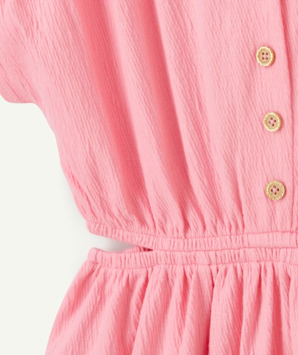 robe fille en matière gaufré rose avec ouvertures cotés
