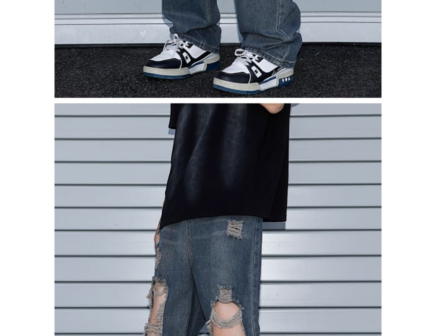 Trimecca - Hoge taille jeans met wijde pijpen en versleten look