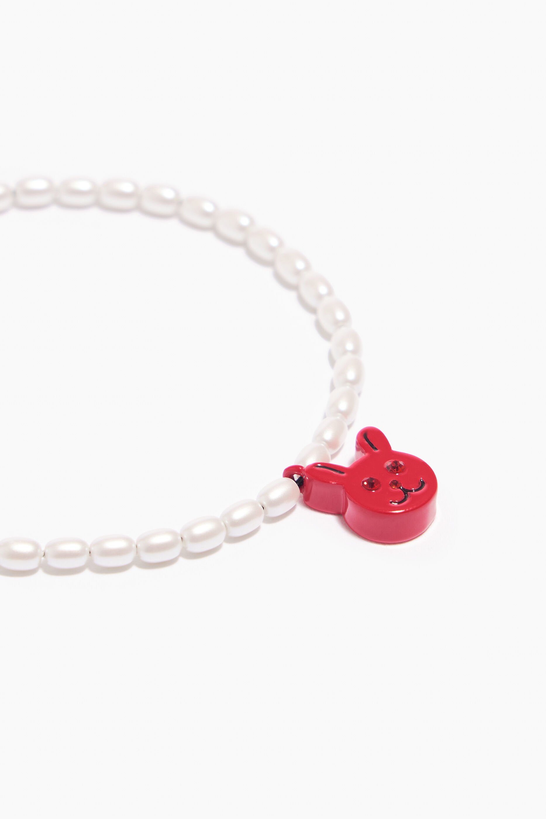 Pulseira de pérolas de coelho vermelho