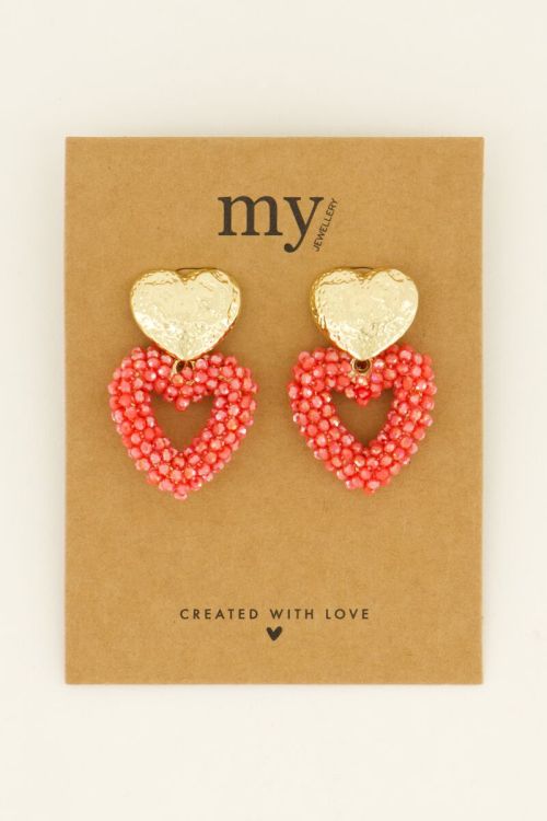 Statement hartjes oorbellen met goudkleurige knop