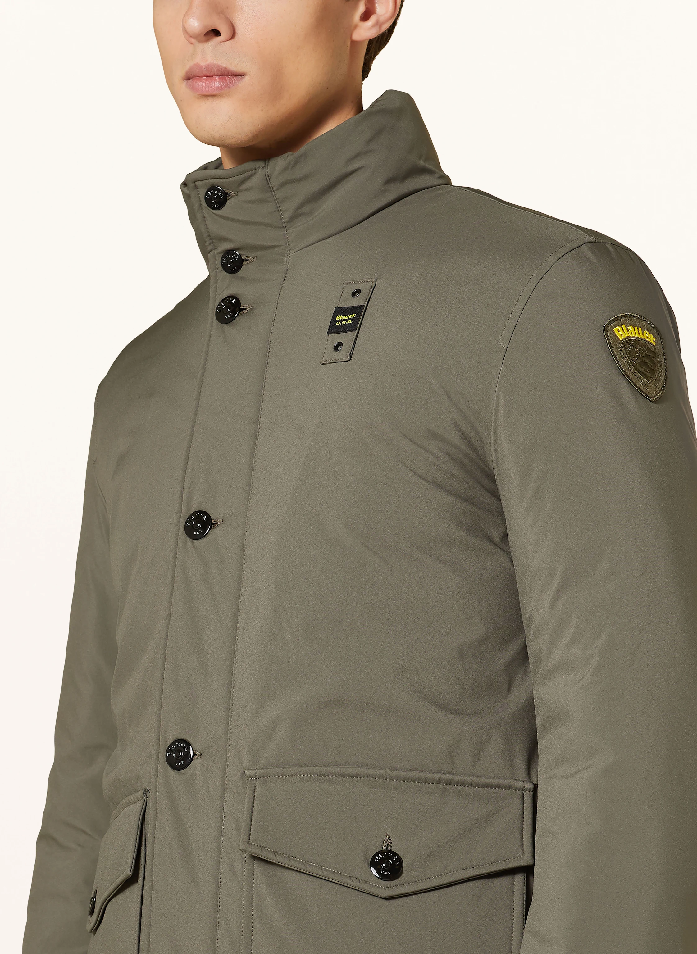Blauer Daunenparka