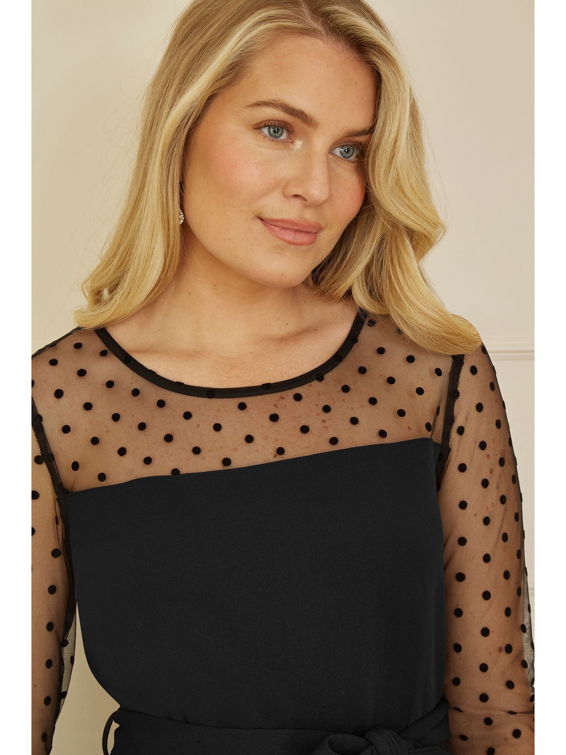 Yumi jumpsuit met stippen van stretch gaas