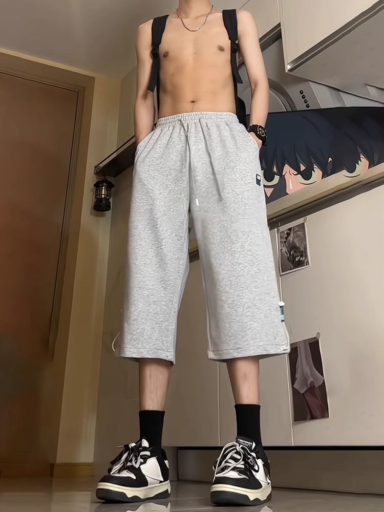 Posive - Capri-joggingbroek met trekkoord in de taille en applicatie