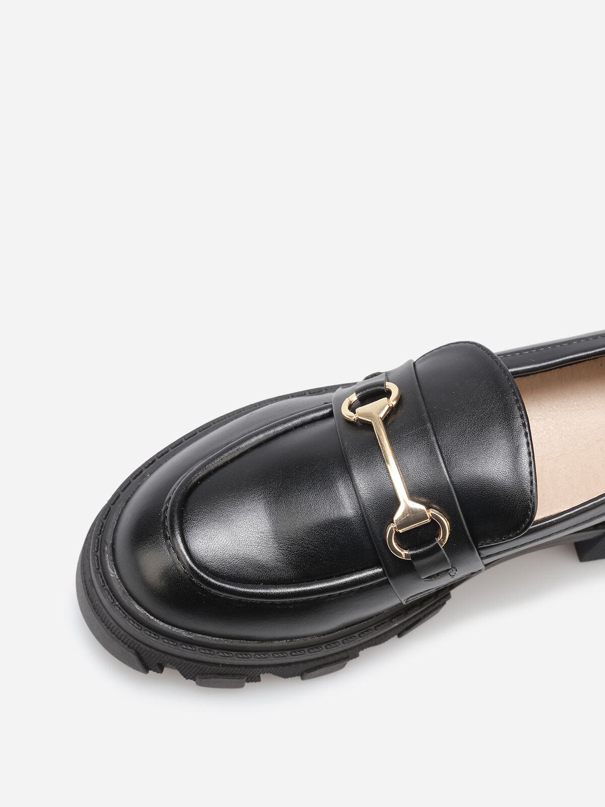 Mocassins crantés à détail métallique- Noir