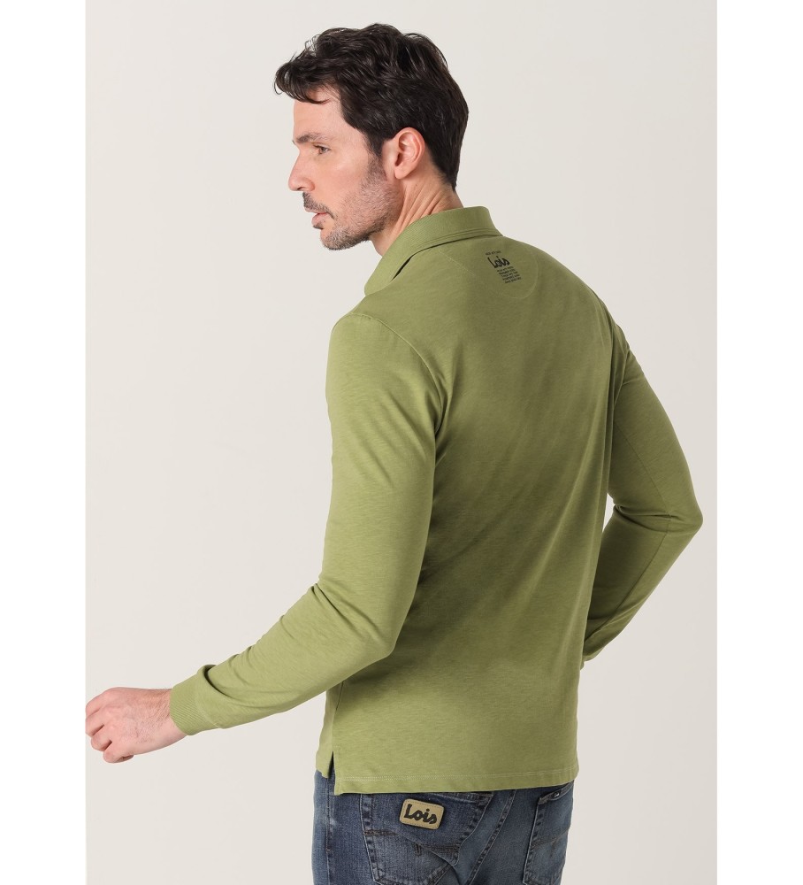 Camisa polo Lois de manga comprida com bolso verde.