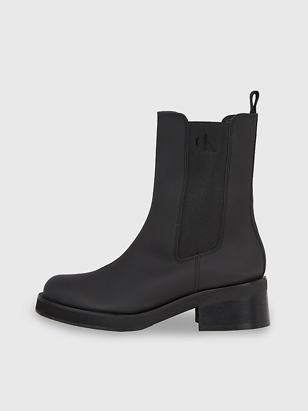botas de couro até o tornozelo