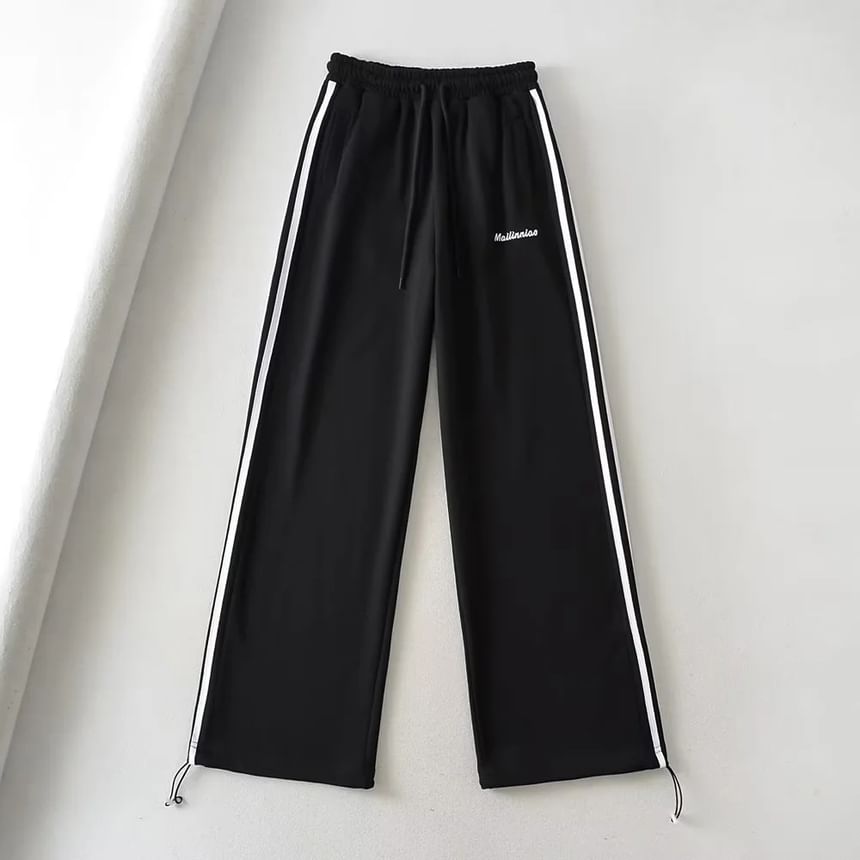 Reknovine - Wijde joggingbroek met trekkoord en gestreepte letters