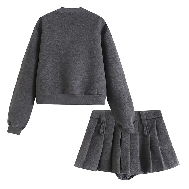 Sundine - Baseballjack met ronde hals en knoopjes / Mini geplooide rok / Set