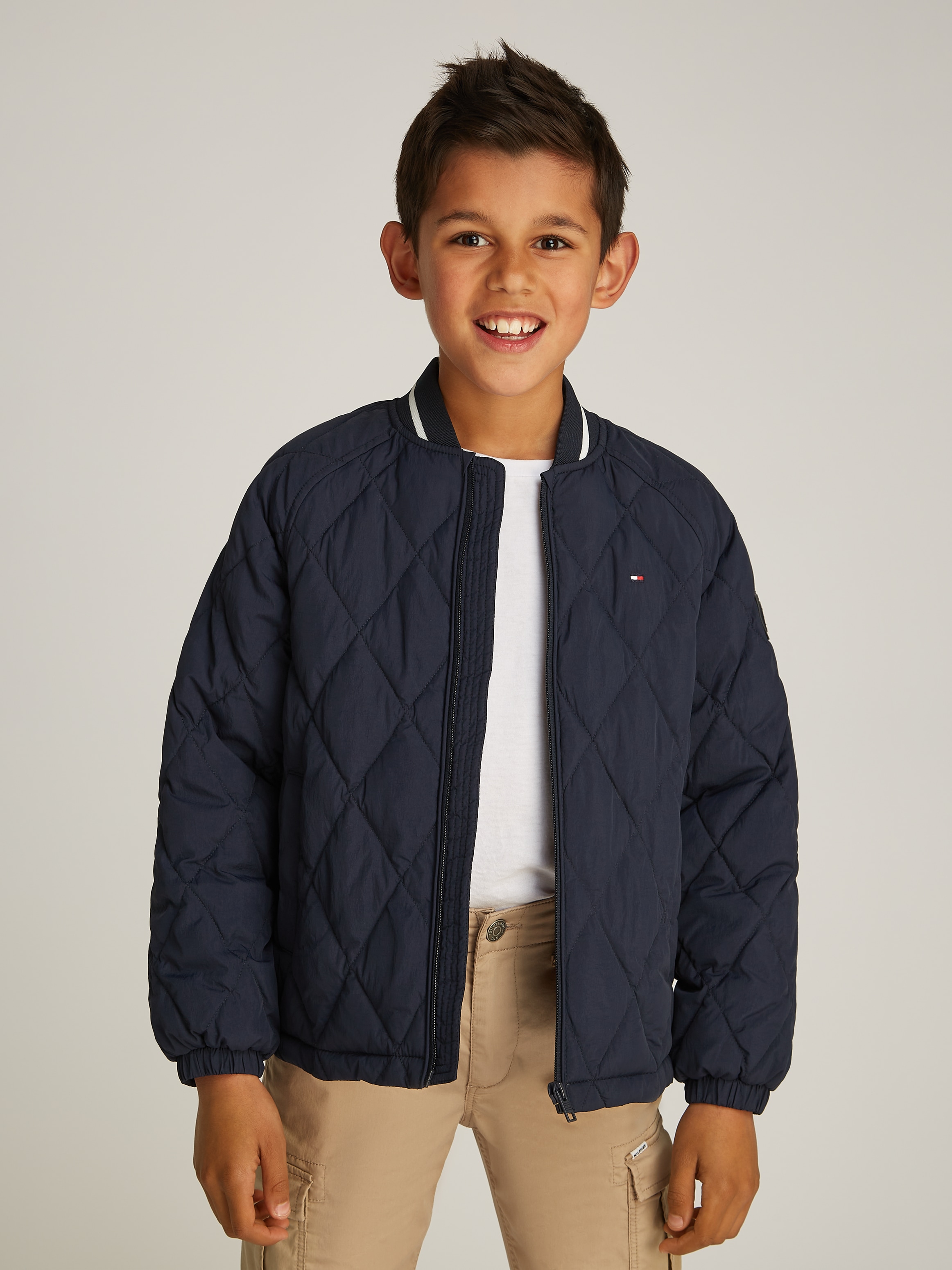 Tommy Hilfiger Steppjacke »U QUILTED JACKET« mit wärmender Wattierung