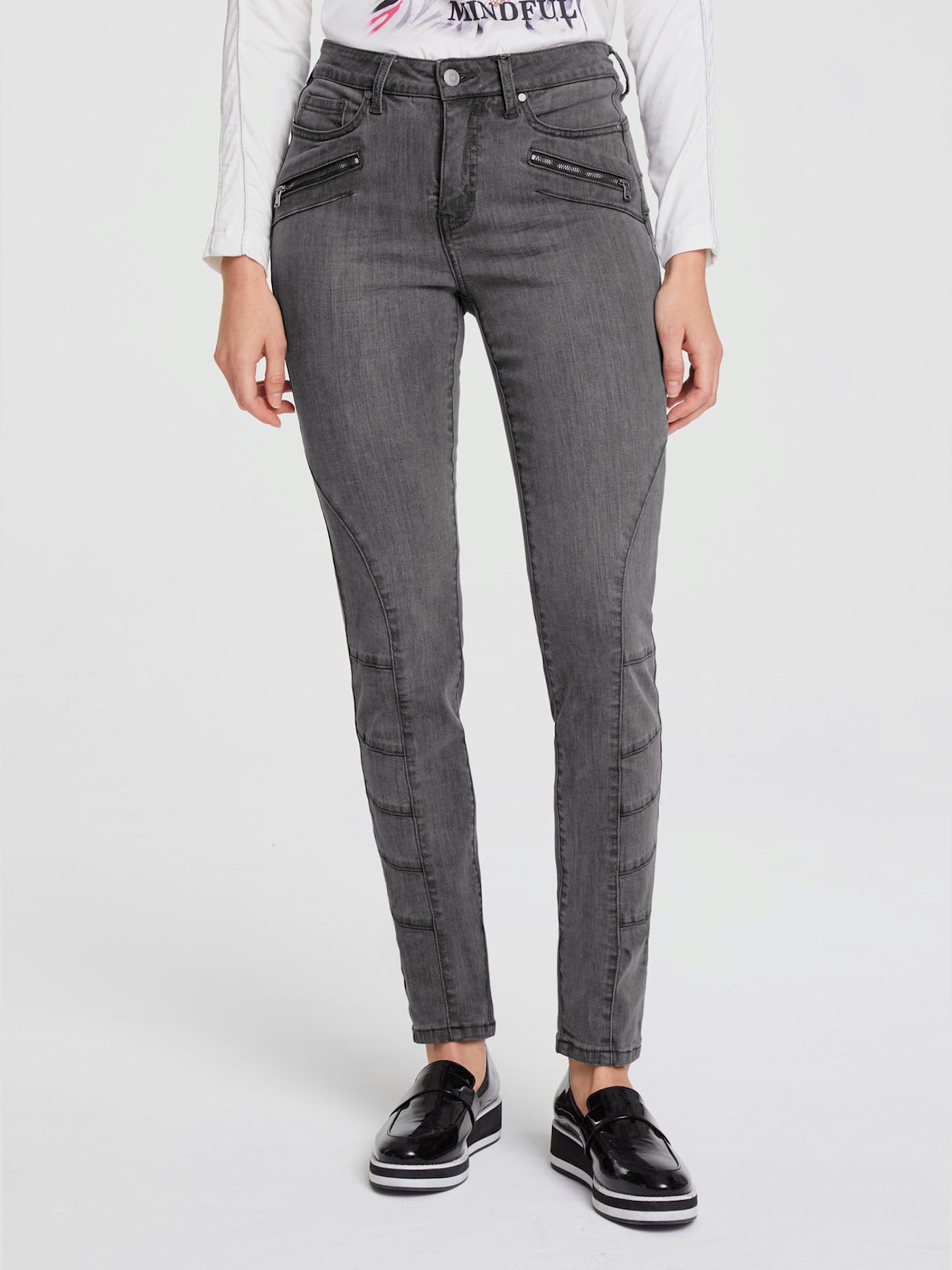Jeans effet ventre plat glissières décoratives