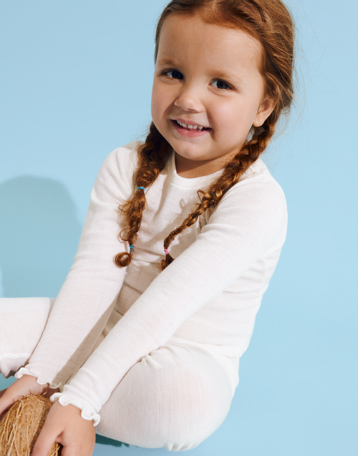 Pointelle romper met lange mouw van merinowol/zijde voor baby's
