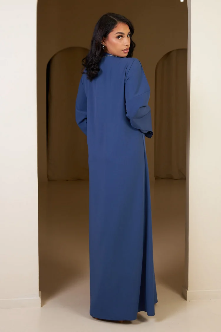 Robe bleue à strass à noué sur le côté